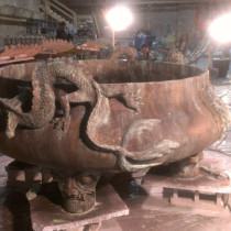 PROPS DRAGONS CAULDRON #1 - Scuptors: Fabrice Lapa, Denis Desjardins and Anne-Merie Fisette. Two copies were made using a water resistant hard plaster. In the background we see roof casted pieces ready to be installed